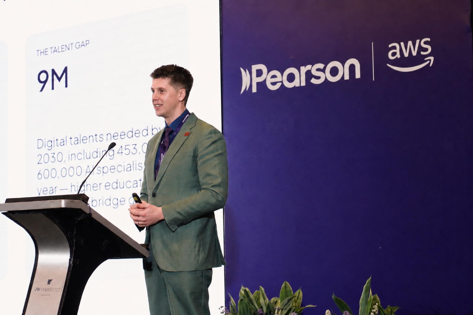 Dr Mike Perkins speaking at a Pearson and AWS event